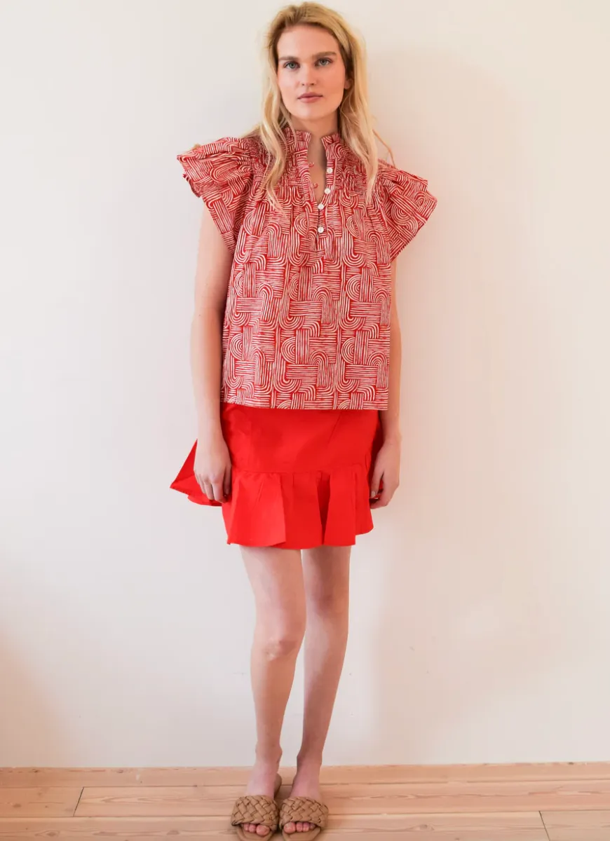 Never A Wallflower/ Smocked Top Red Swirl